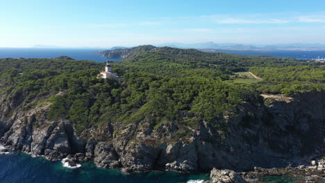 White-lighthouse-in-Porquerolles-aerial-back-traveling-France